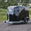 Debon Cargo 1300 Box Trailer on a country road.