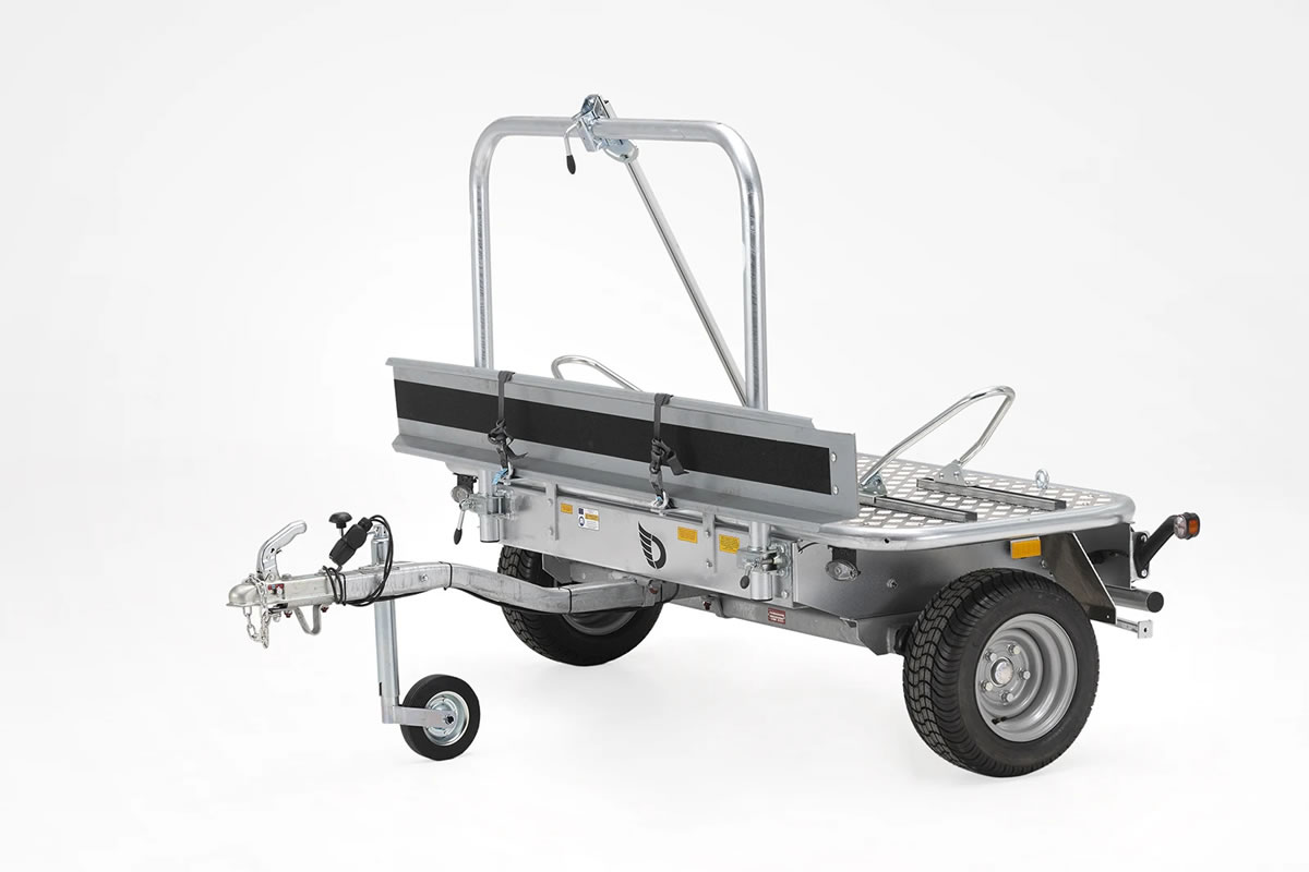Small motorcycle trailer designed for efficient towing.